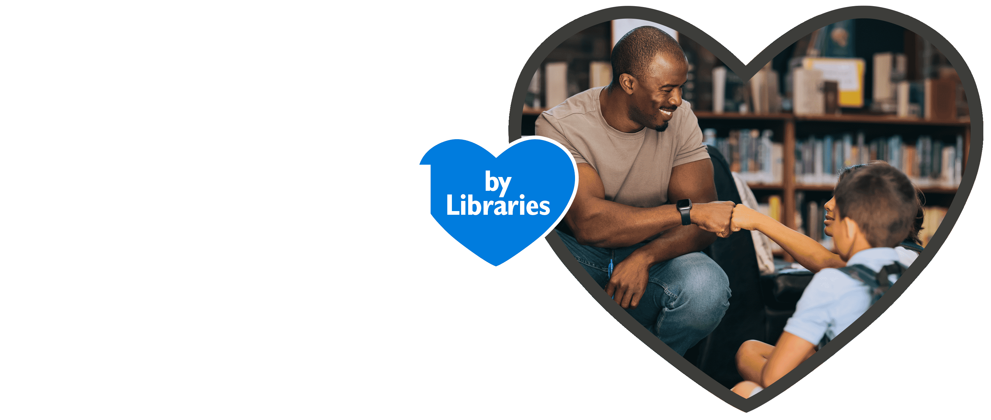 Empowered by Libraries - A man fist-bumps with one of a group of students sitting on the floor of a library.